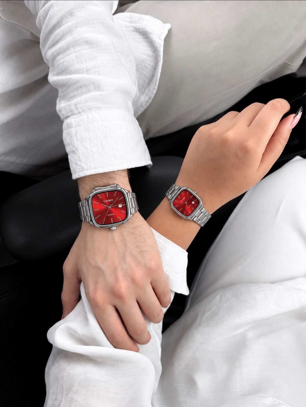 A pair of watches displayed together
